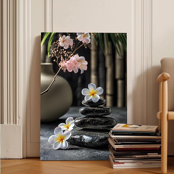 A harmonious black stone stack paired with white and pink flowers bamboo and ceramic vases creates a tranquil Zen decor for minimalist homes and mindful spaces 24x36in Wood Framed