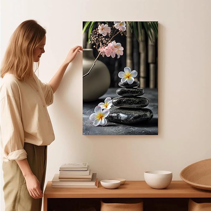 A harmonious black stone stack paired with white and pink flowers bamboo and ceramic vases creates a tranquil Zen decor for minimalist homes and mindful spaces 16x24in Wood Framed