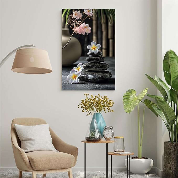 A harmonious black stone stack paired with white and pink flowers bamboo and ceramic vases creates a tranquil Zen decor for minimalist homes and mindful spaces 24x36in Wood Framed
